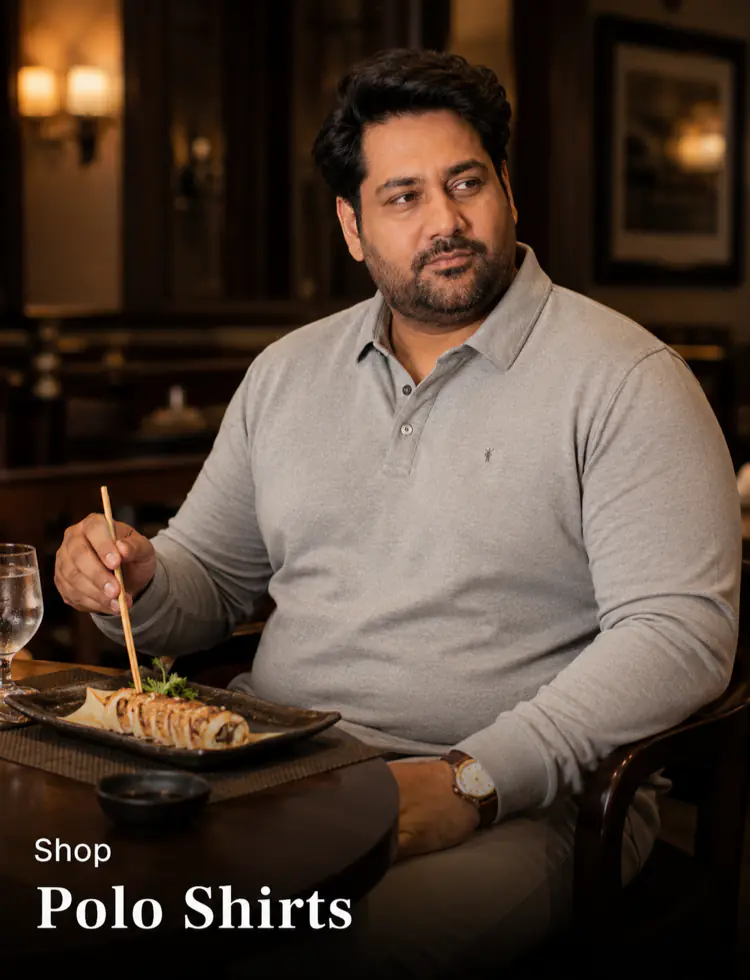 Plus size polo shirts for big men Pakistan - heavyset model in grey pique polo at dinner table