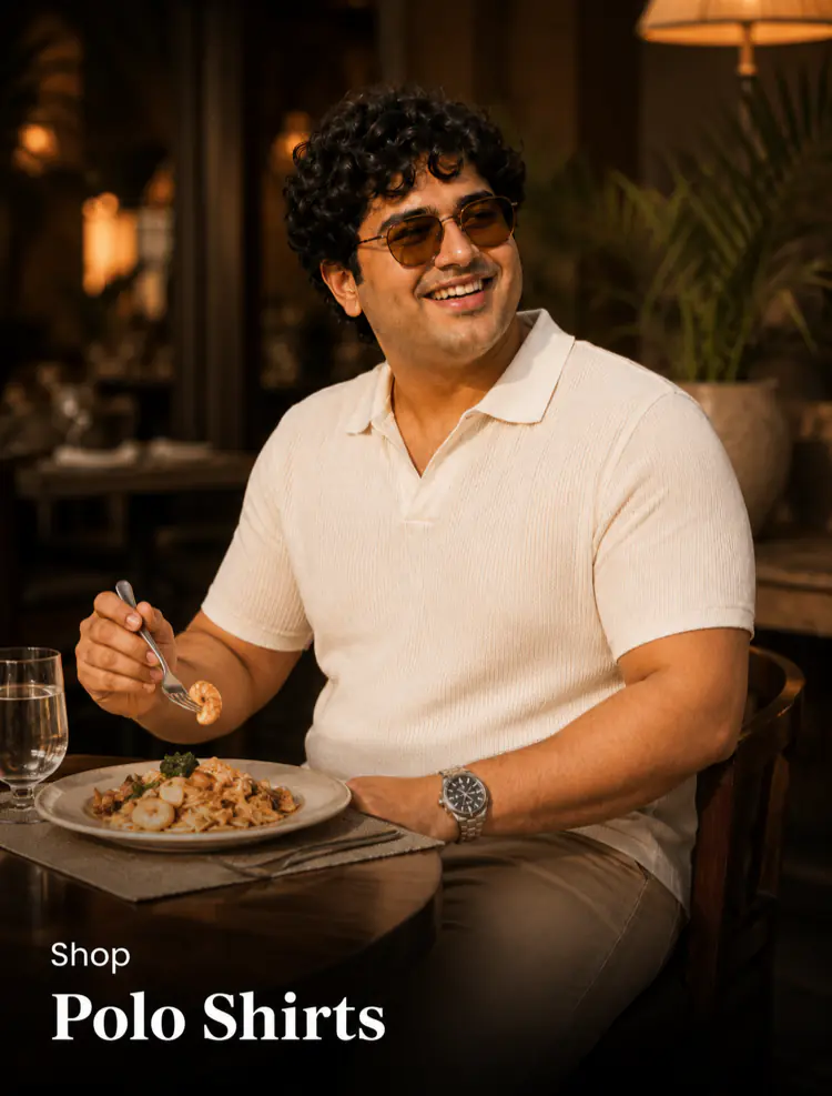 Plus size polo shirts Pakistan - heavyset man smiling in cream knit polo at a restaurant table