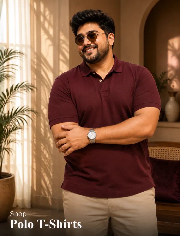 Big size polo t-shirts Pakistan - plus size man in maroon polo shirt smiling indoors