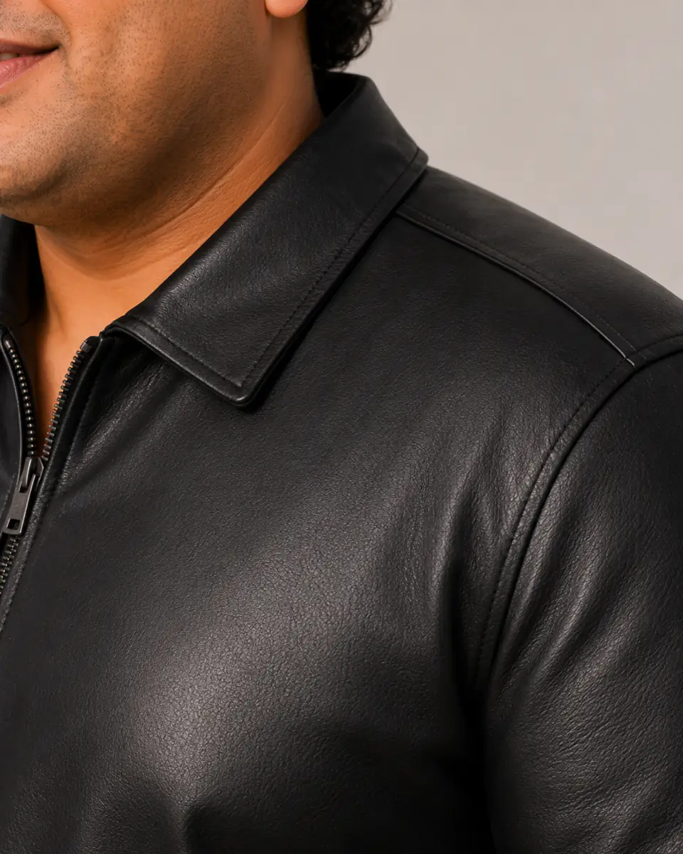 Plus size leather jacket shoulder seam collar construction close-up